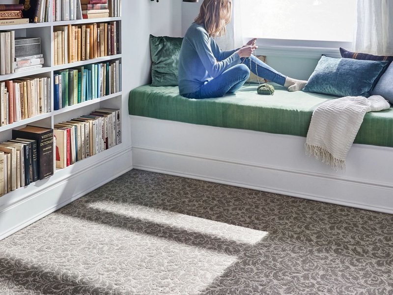 Woman in bad, planning- CARPET LOVER PLUS in Uxbridge, MA